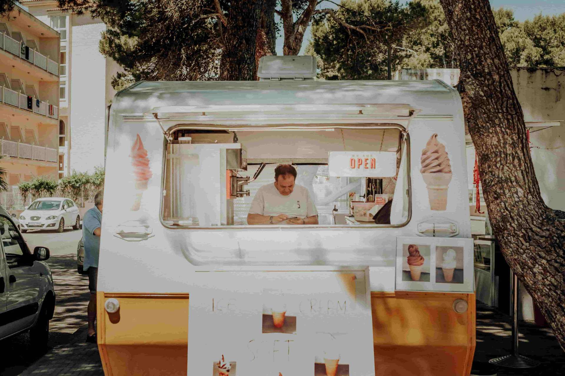 Food truck vendor in Spain representing small business insurance for expats and self-employed